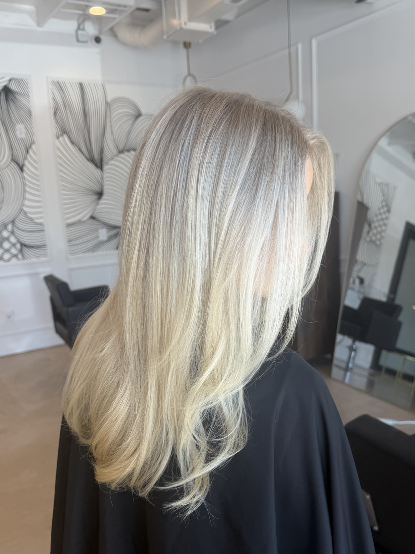 Bright platinum blonde, straight and glossy
