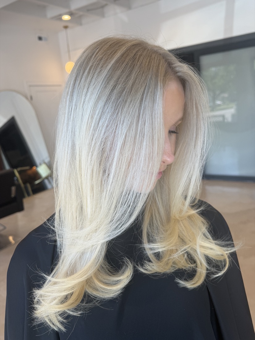 Icy platinum blonde with curled ends